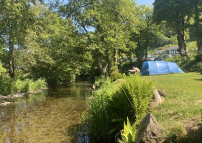 camping dell with stream